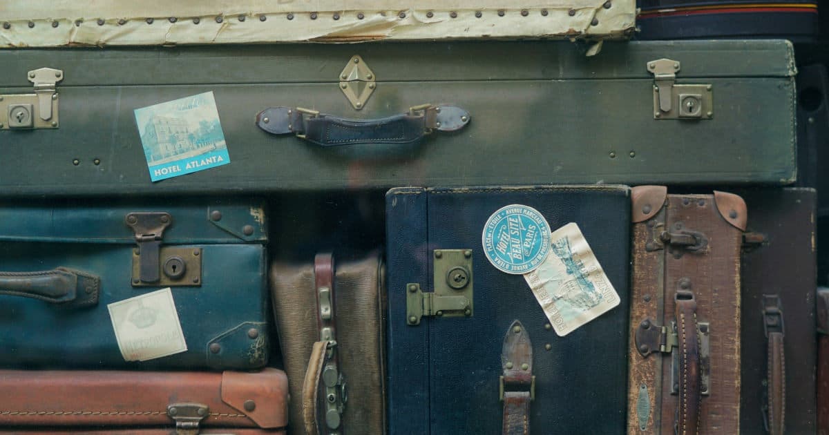 stock photo of suitcases piled on top of each other