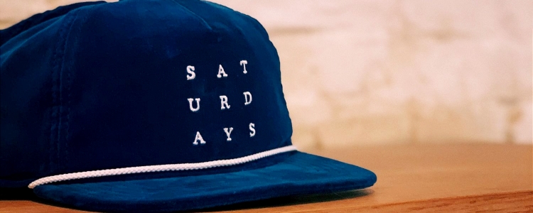 baseball hat that reads SAT-URD-AYS (maybe NOT something you should wear to the office on the weekend)
