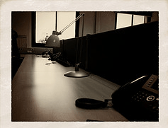 Empty desk, originally uploaded to Flickr by Aldric van Gaver.