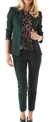 woman wears green suit with ankle pants for work