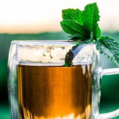 mint tea - it'll make your office smell good and won't annoy your coworkers!