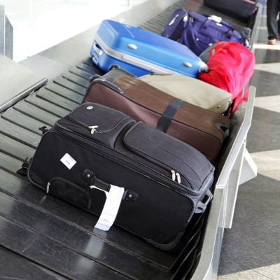luggage on a baggage return carousel