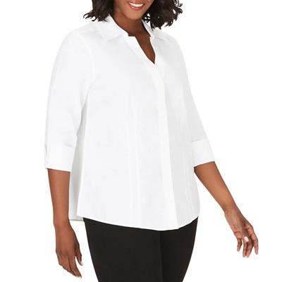 A woman wearing a white blouse and black pants