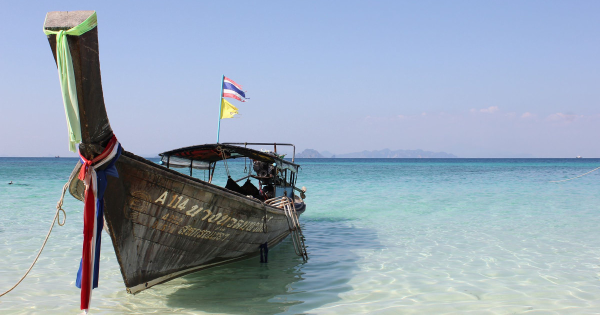 stock photo of a boat in clear blue waters