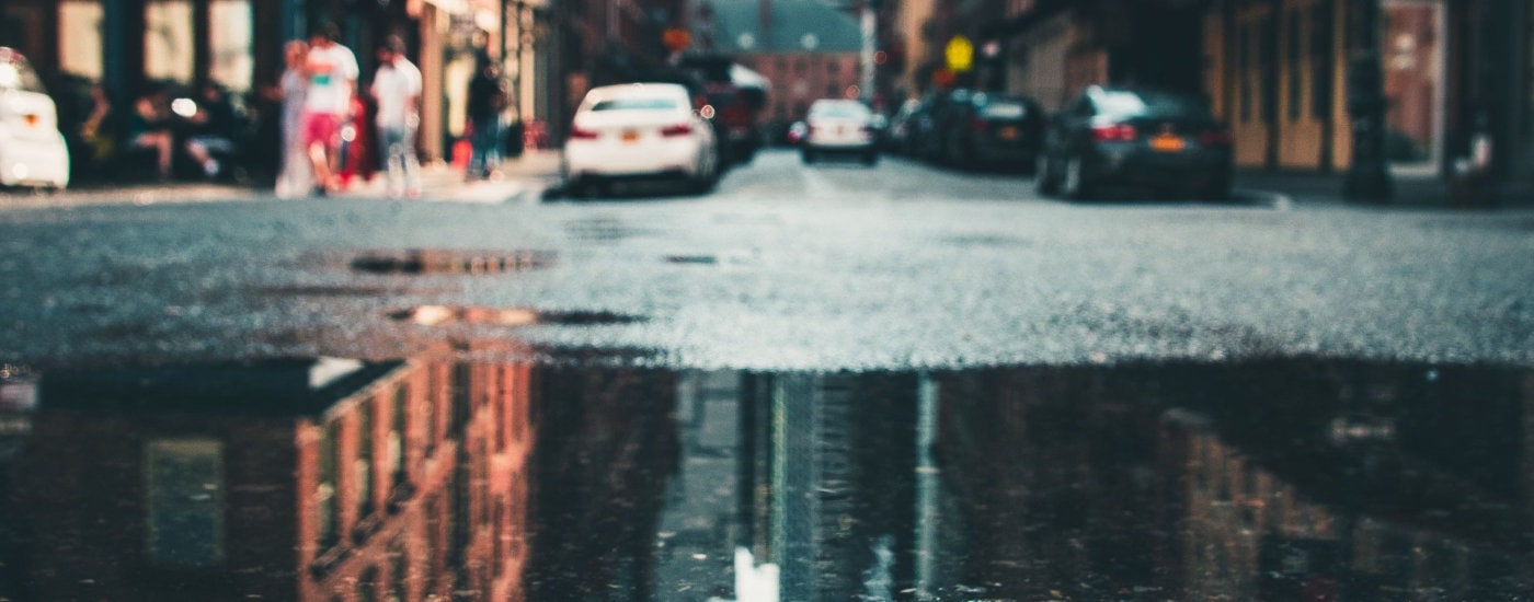 city street with huge puddle