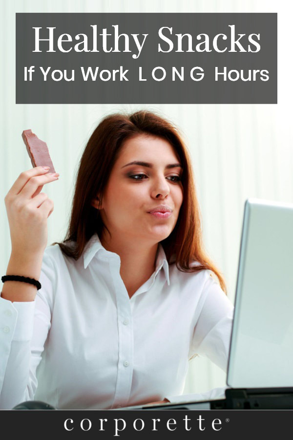 stock photo from above (professional woman with bar) with text reading Healthy Snacks If You Work  L O N G  Hours