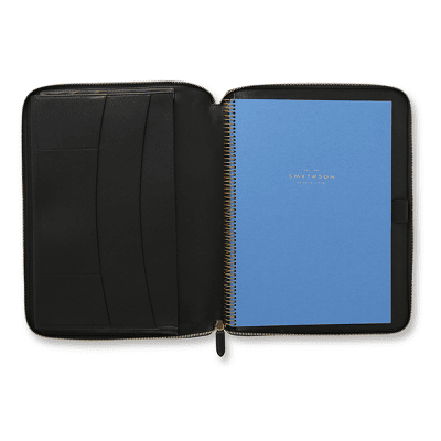 a black leather writing folder and stylish padfolio