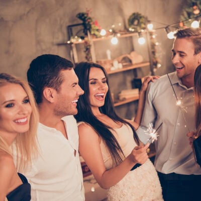 young professionals celebrate at a house party