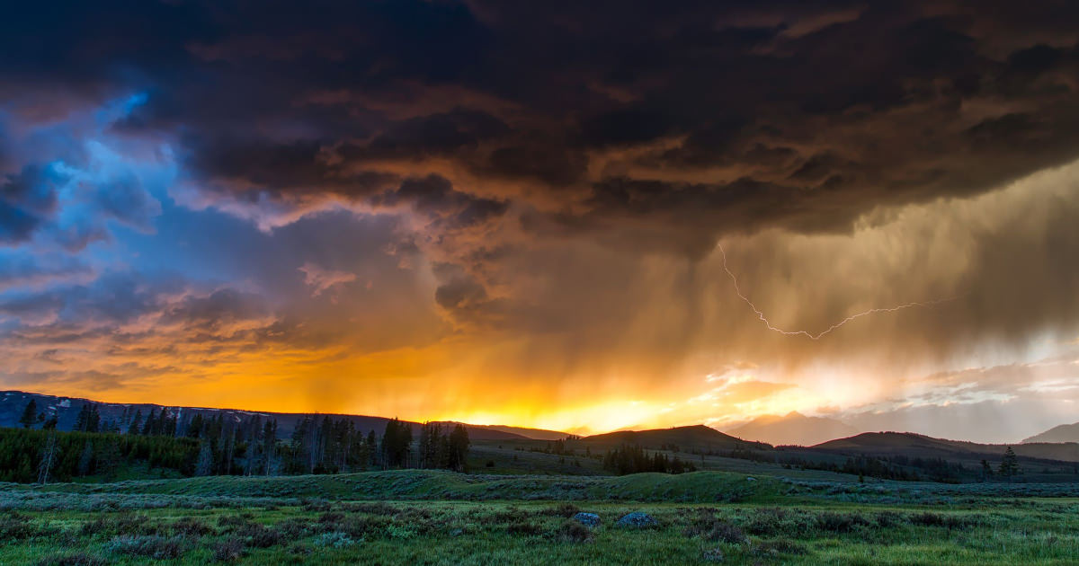 stock photo of heavy clouds over a field