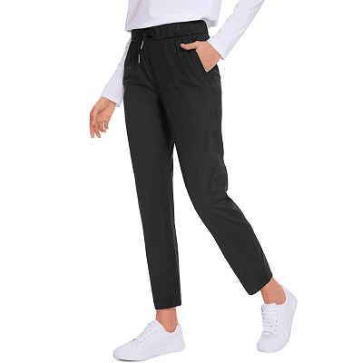 woman wears highly rated golf pants at Amazon