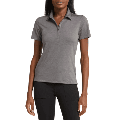woman wears highly rated golf top from TravisMathew