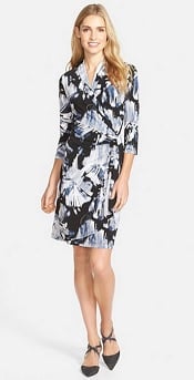 stretchy dress with V-neck and cascading ruffle-ish detail that begins at waist and goes down side of skirt