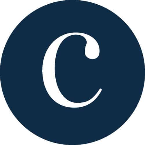 A navy circle with a white C 