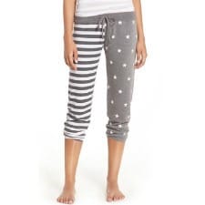gray pajamas with stripes on one leg and polka dots on the other