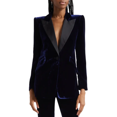 professional woman wears velvet festive blazer