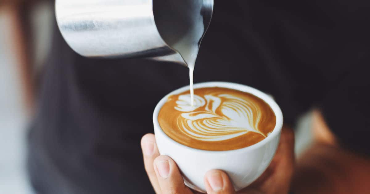 woman pouring coffee