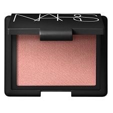 The Best Makeup Products to Use to Fake a Good Night's Sleep #4: NARS Orgasm Powder Blush | Corporette