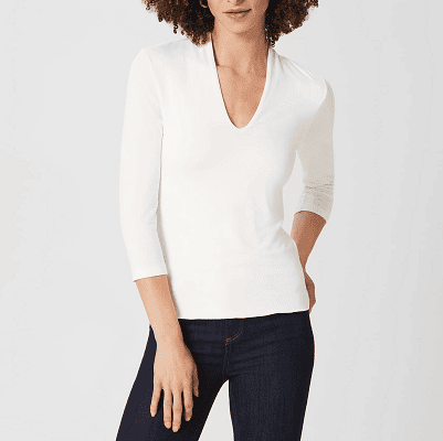 double-layered white top with deep V and elbow-length sleeves