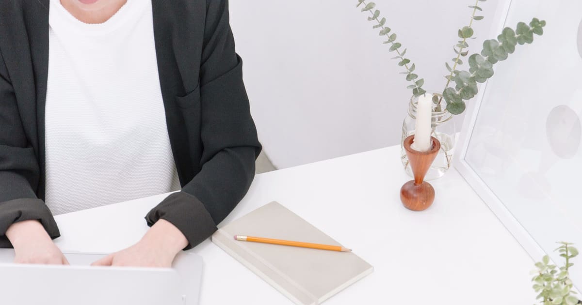 professional young woman typing at computer