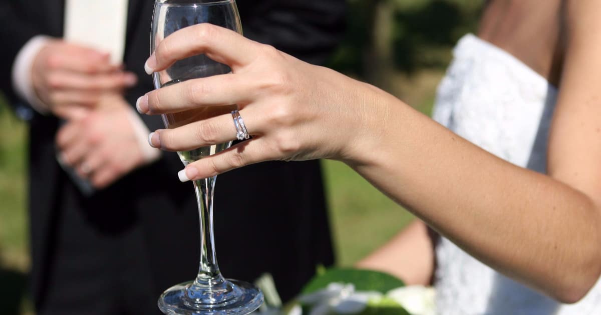 how to deal when your boss makes rude comments about your engagement ring - image of a bride's ring finger
