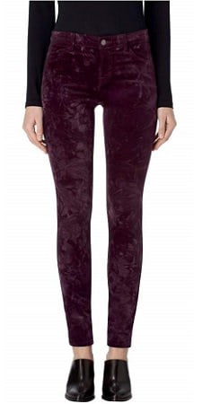 A woman wearing a pair of J BRAND Womens Pants Hipster Skinny Crystal Aubergine