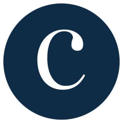 A navy blue circle with a white C in it