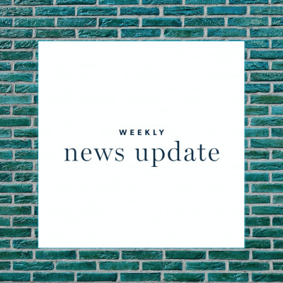 A white square with text "weekly news update," surrounded by a green brick border