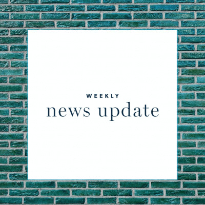 A white square with text "weekly news update," surrounded by a border of green bricks