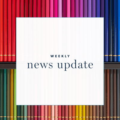 A white square with the text "weekly news update" surrounded by a square border with a book design
