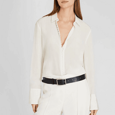white silk blouse with many button loops along side