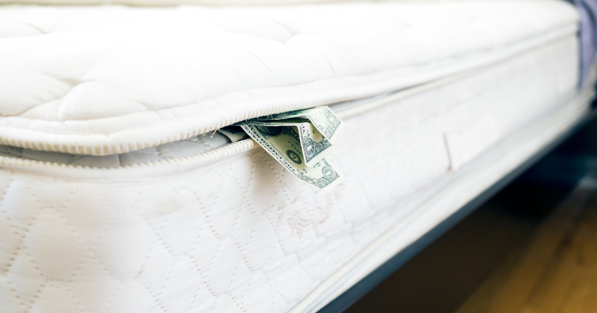 cash stuffed between mattress and box spring