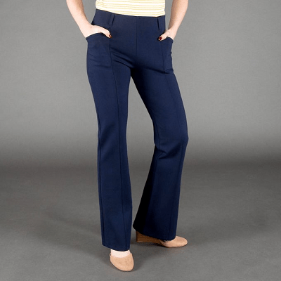 woman wears bootcut office yoga pants that are machine washable dress pants