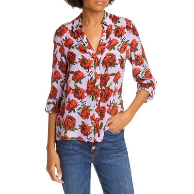 https://corporette.com/wp-content/uploads/2019/12/Eloise-Roll-Sleeve-Floral-Print-Silk-Blouse.jpeg