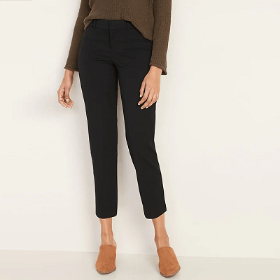 woman wears black pants with beige shoes