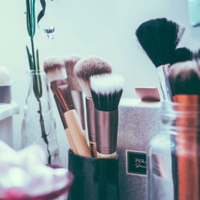 makeup brushes and more on a counter