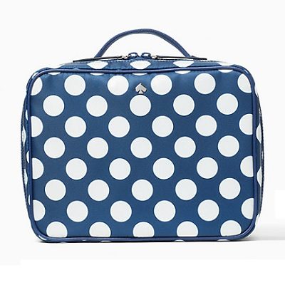 travel cosmetic bag with white dots against navy