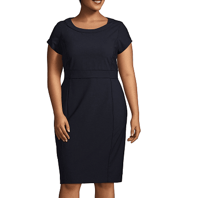 woman wears plus-size work dress in wool