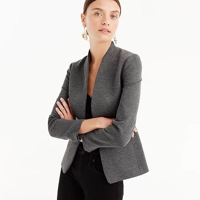 professional woman wears collarless blazer