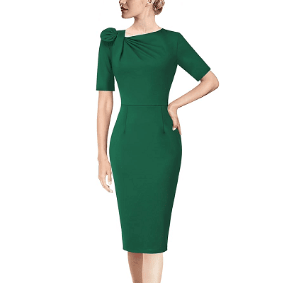 business cocktail attire: a green dress with a bow detail on the shoulder