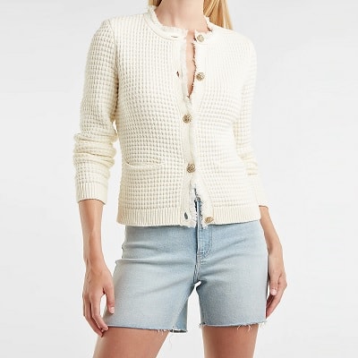 https://corporette.com/wp-content/uploads/2021/10/Textured-Embellished-Button-Fringe-Sweater-Jacket.jpg