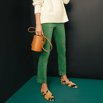 warm winter dress pants for women: green corduroy pants with a side zip and kick flare