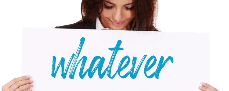 young professional woman looks down at a large sign she's holding; the word WHATEVER is written on the sign