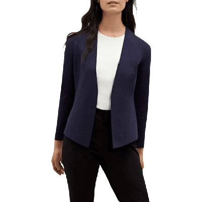 model wears navy Woolf jardigan sweater jacket, white top and black pants