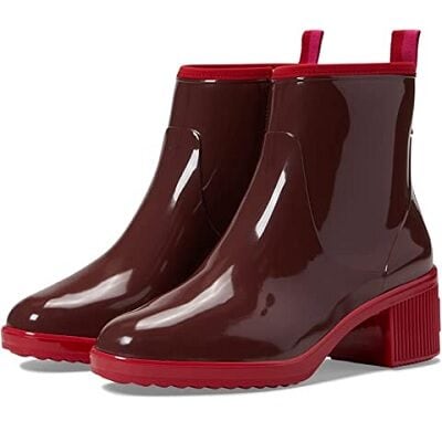 heeled short rain boots with shiny burgundy uppers and a red rubber footbed, sole and heel