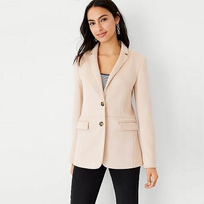 Ttan faux-suede blazer with Notched lapel. Long button-open sleeves
