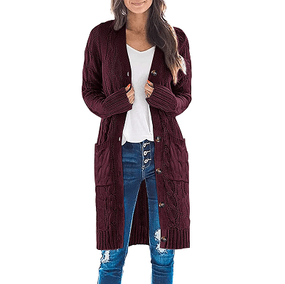 woman wears long burgundy cable knit cardigan with buttons and pockets