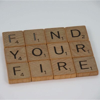 Scrabble tiles spell "Find Your Fire"