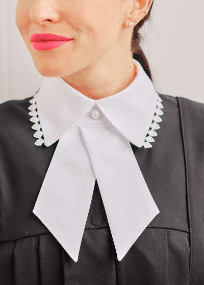 woman wearing judicial robe with jabot aka collar or flap