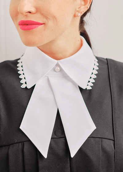 woman wearing forensic robe with jabot aka collar or flap