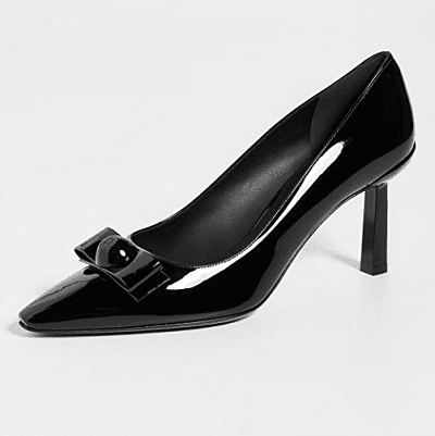 black patent pumps with a bow detail and a skinny block architectural heel